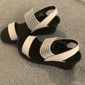 Skechers Cali Rumblers Sci-Fi wedge sandal size 9. White and black. See pictures